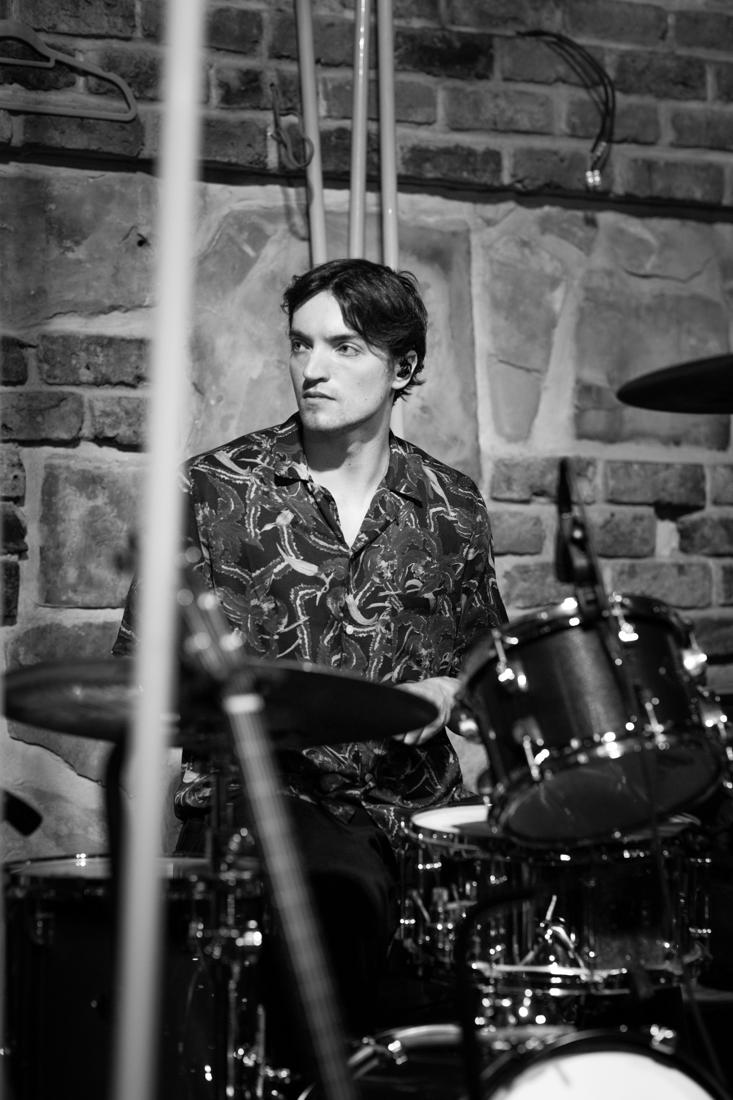 Jonathan, our drum tutor, playing an acoustic drum kit